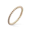Gold by Frisenberg – Liten kulering i gult gull – blank overflate