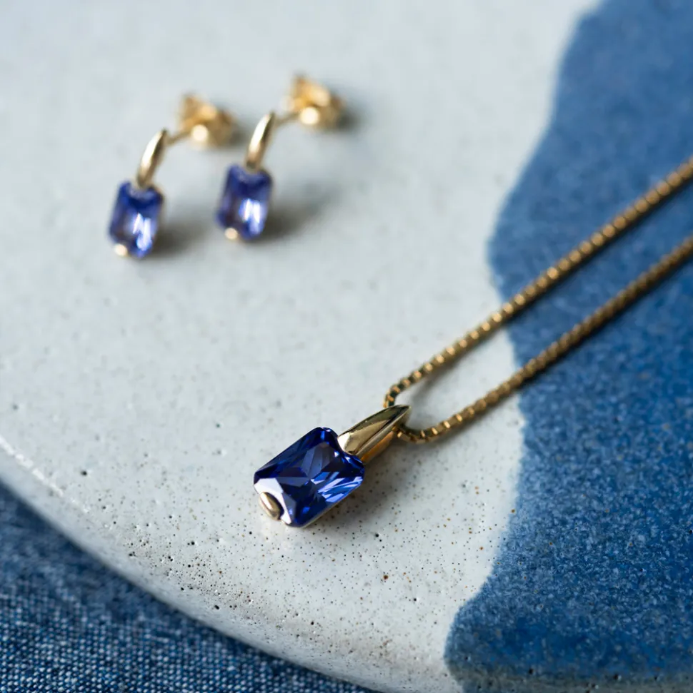 Pan Jewelry – Anheng i gult gull med lilla zirkonia