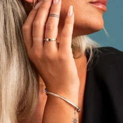 Pan Jewelry – Armring i gult gull med zirkonia
