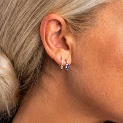 Pan Jewelry – Ørepynt i gult gull med zirkonia